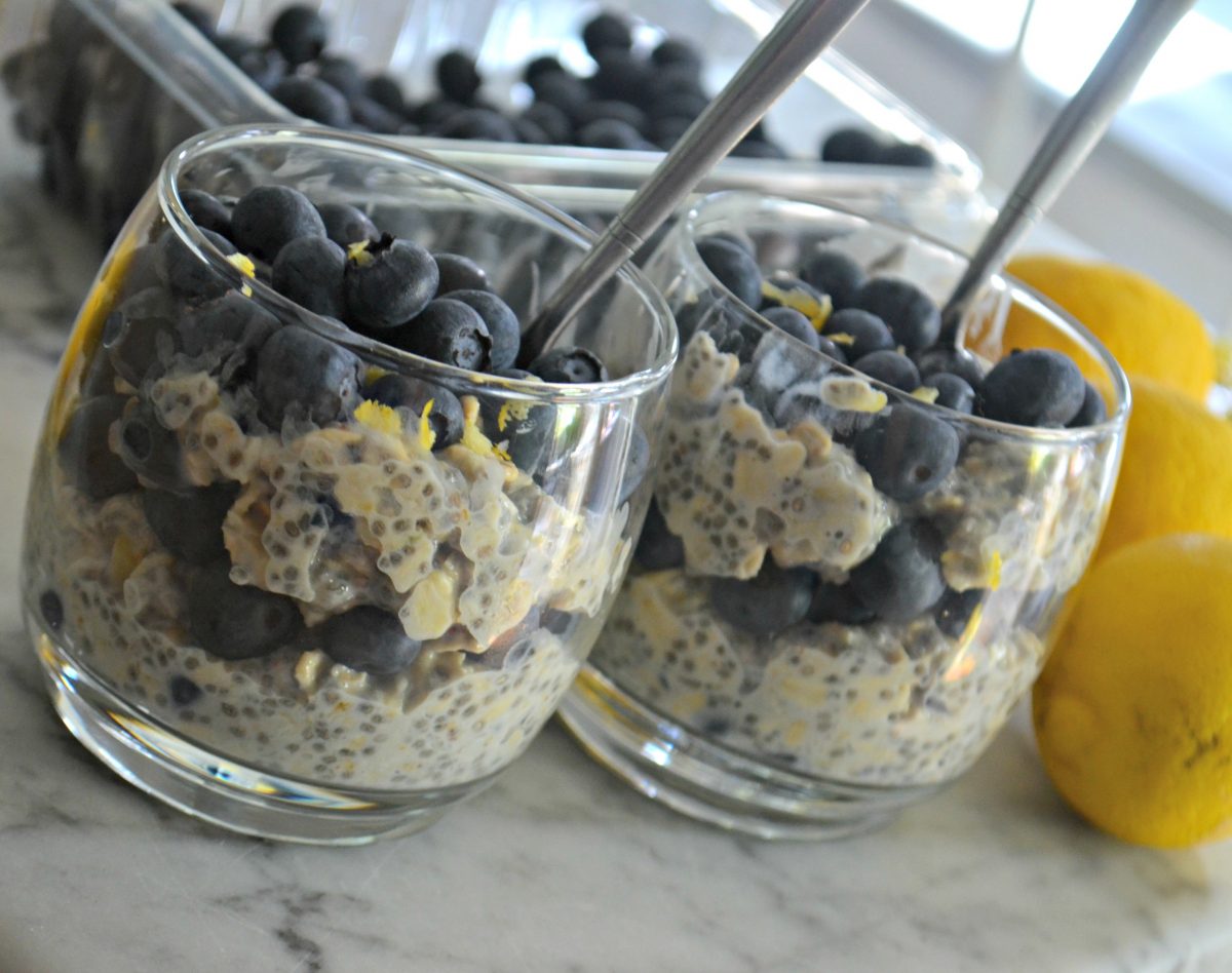 closeup with spoons in the cups of Blueberry Lemon Chia Seed Overnight Oats