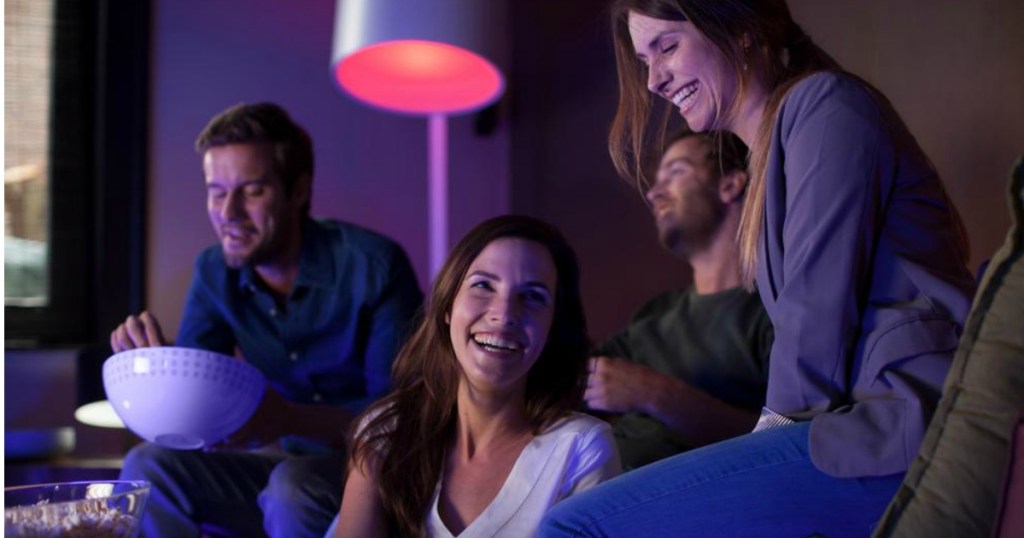 people looking at philips hue bulb