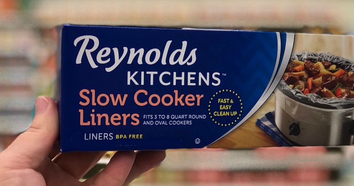 hand holding box of Reynolds slow cooker liners