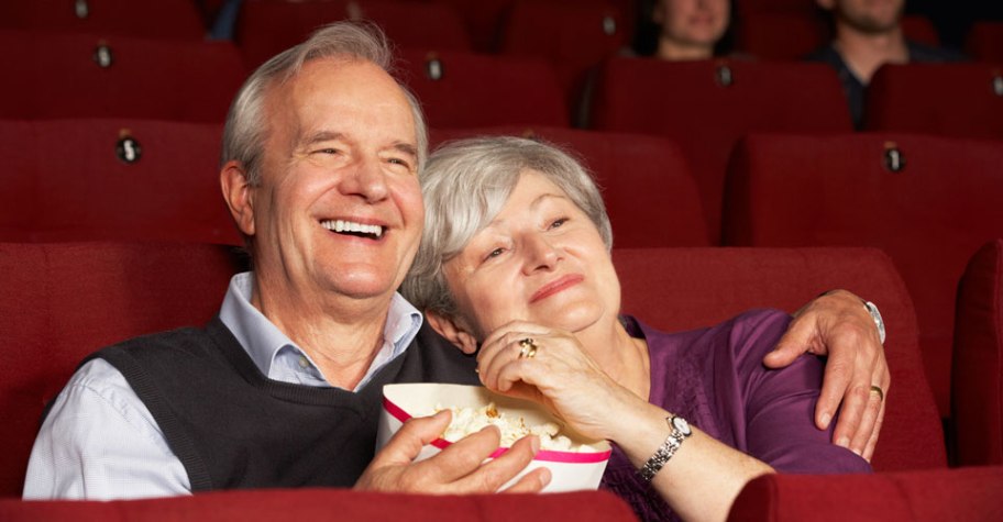 Stores, restaurants, hotels, and other places that offer senior discounts – couple watching a movie