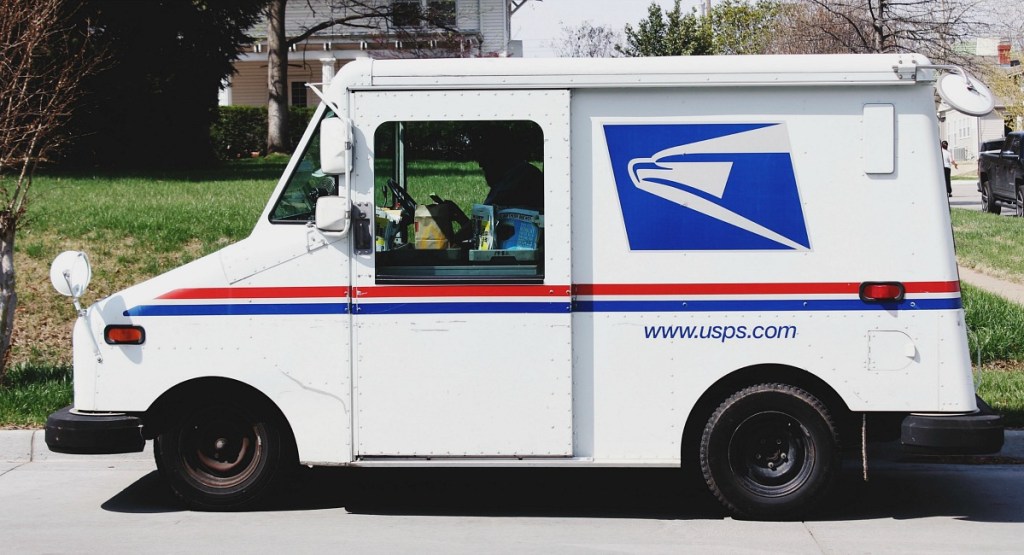 money saving moving tips — usps mail truck