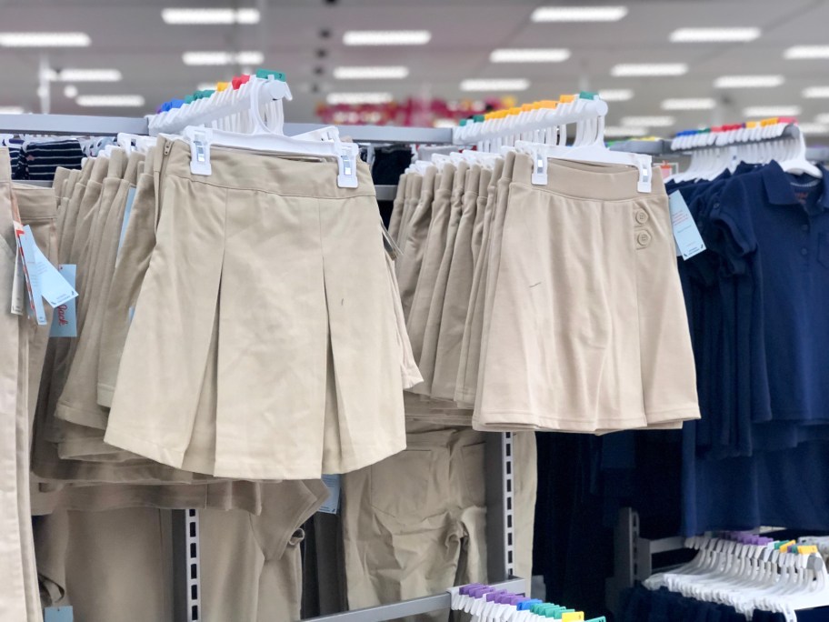 tan uniform skorts hanging in target store