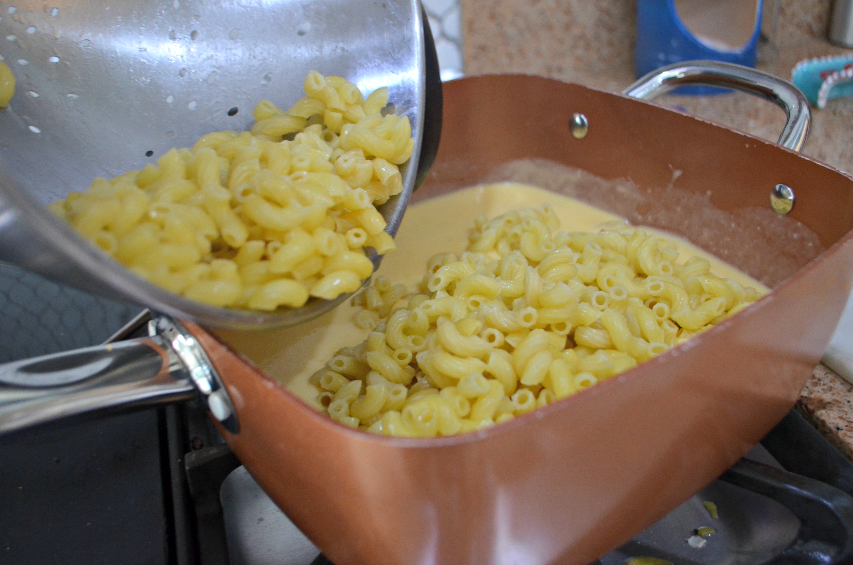 Classic Mac and Cheese just like my mom made! – Adding cooked noodles to the sauce