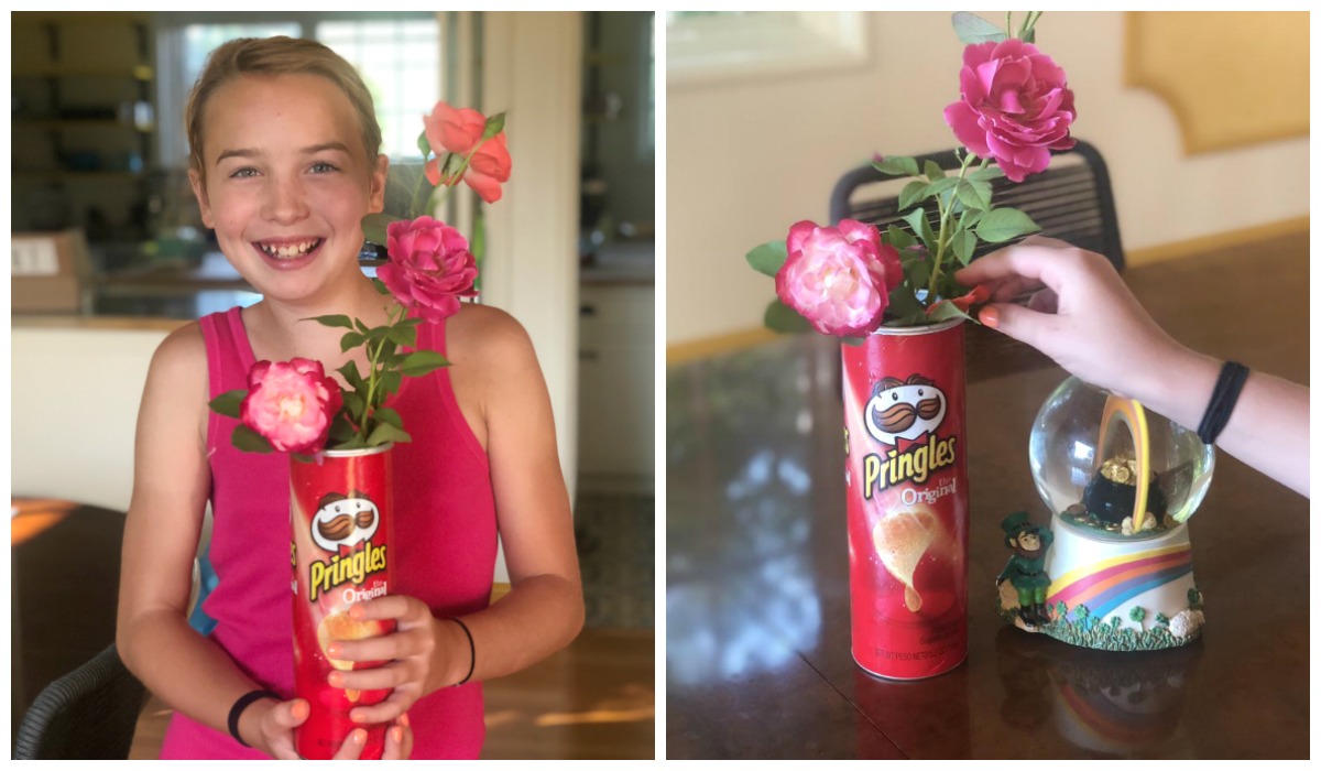 How moving made us feel grateful while having less – collin's daughter piper holding a pringles vase with flowers