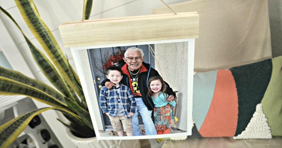 family members featured on wood hanger board print