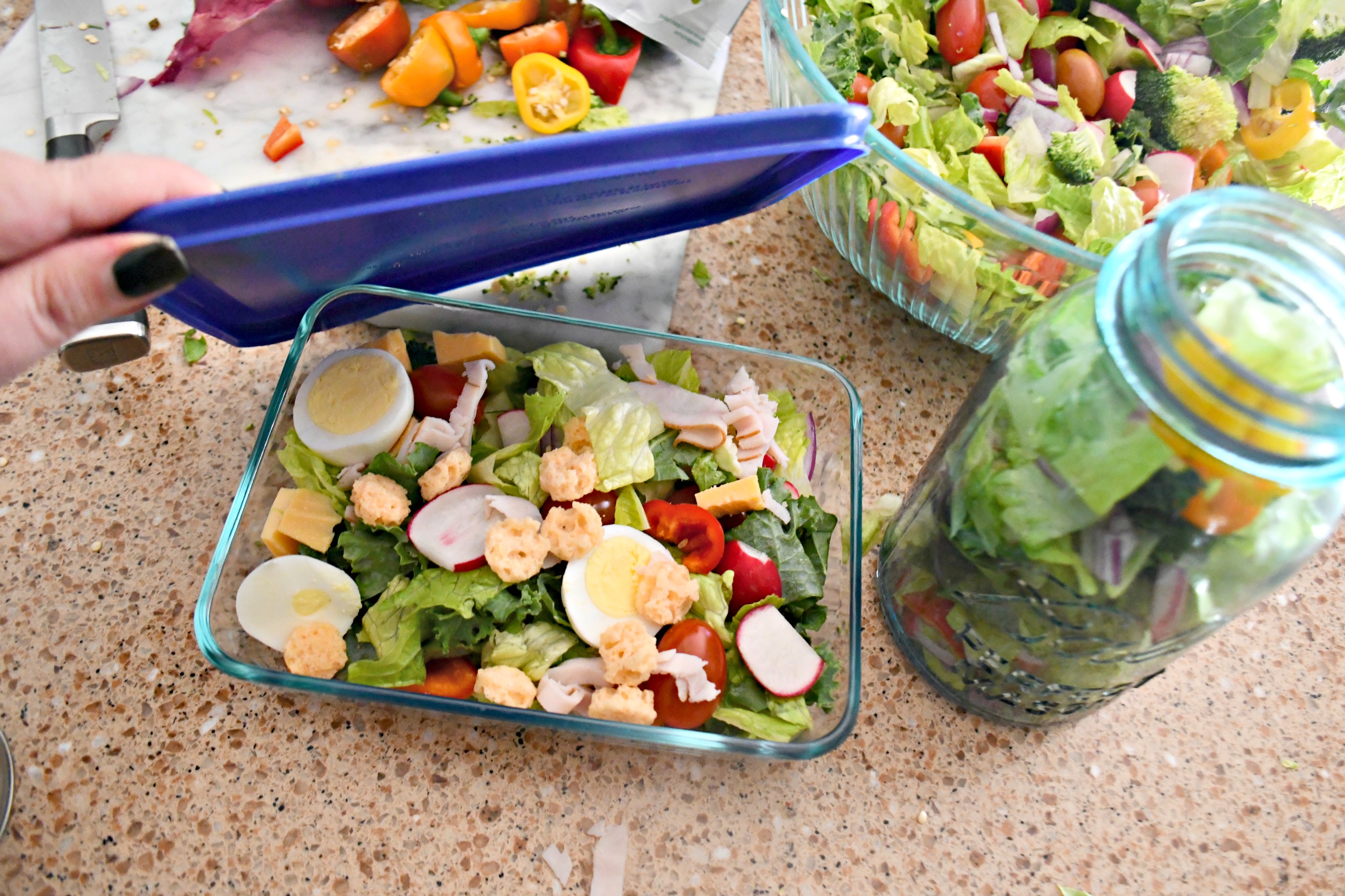 Weekly Sunday Salad Prep and my favorite dressing recipe travel well in these square glass or jar storage containers.