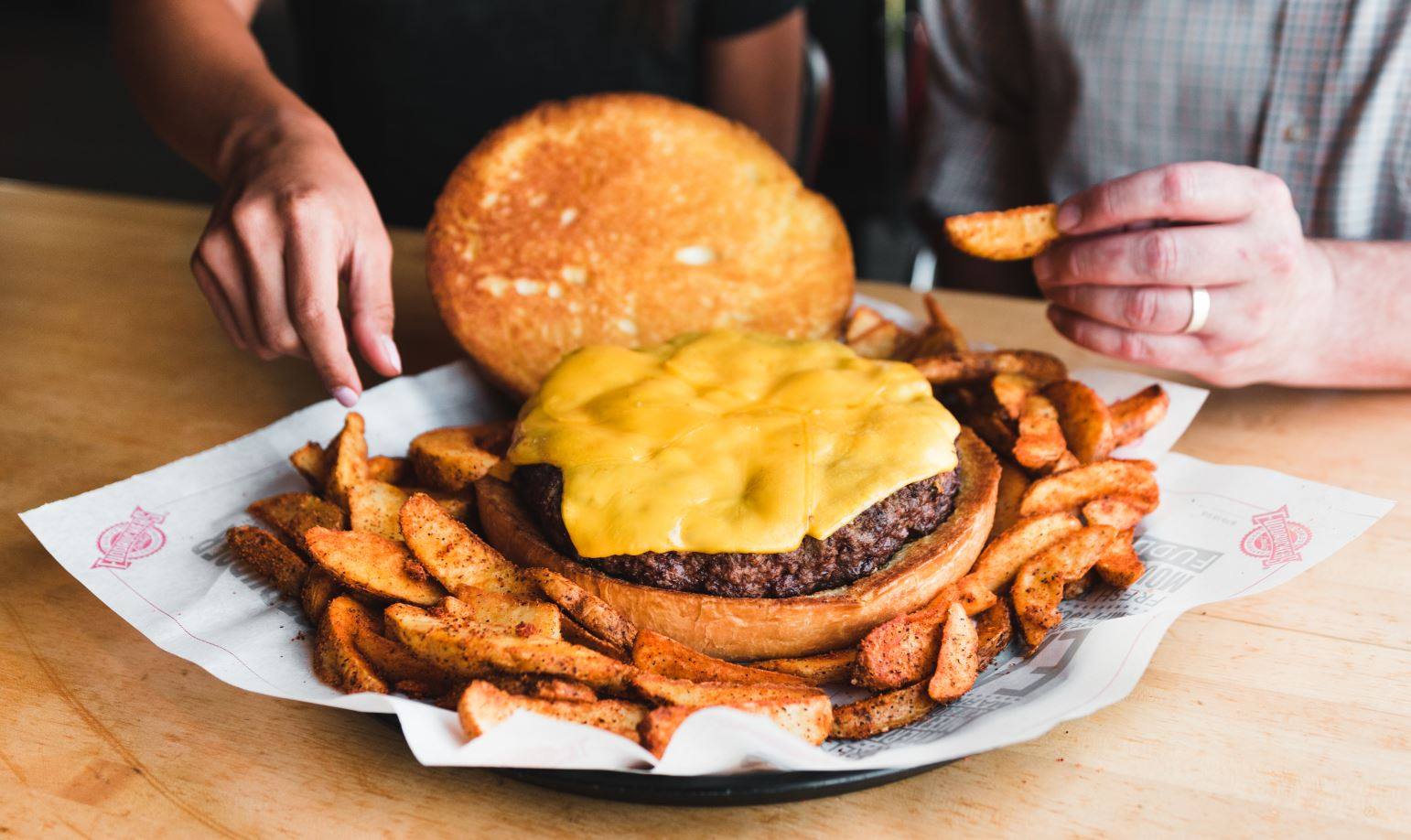 National Cheeseburger Day Deals 2018 - picture of a Fuddruckers 3-pound challenge