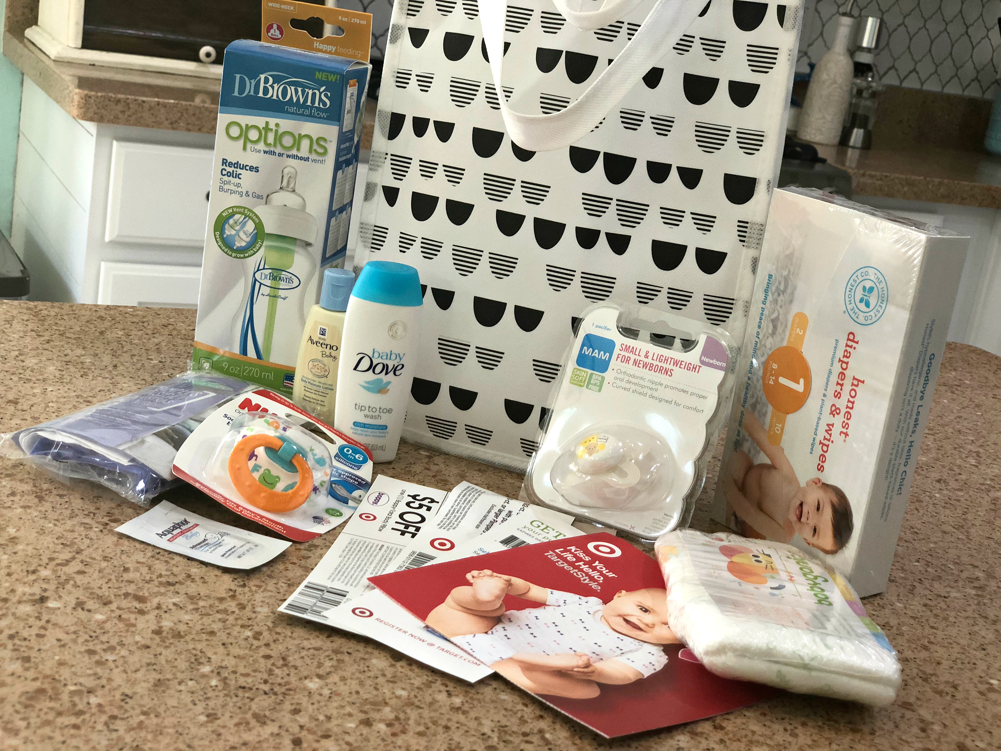 Get a free registry baby gift bag like this one for registering for your baby at Target! Goodies found inside baby welcome gift at Target