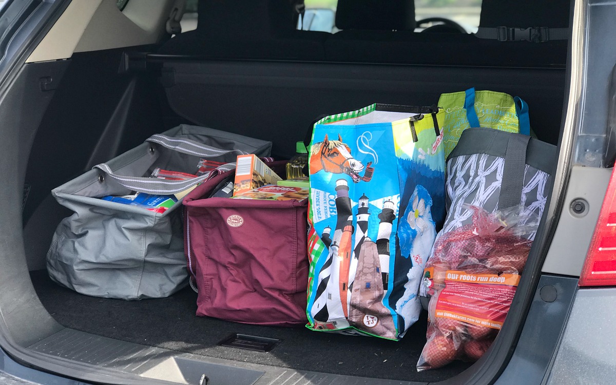 amber's organized meal plans and grocery shops — groceries in trunk of car
