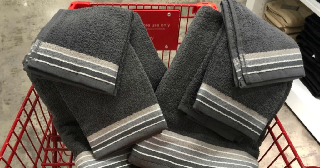 Gray colored towel sets with stripes from JCPenney in-store in red shopping cart