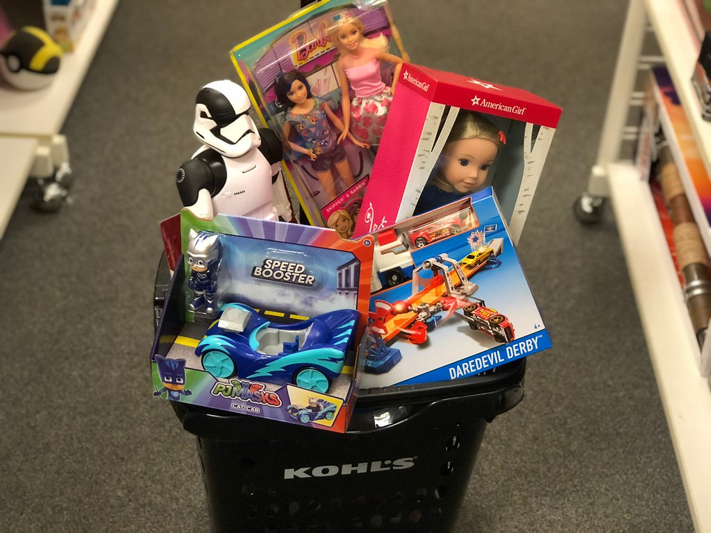 kohl's says no toy discounts, but they promise competitive prices - shown here, toys in a cart