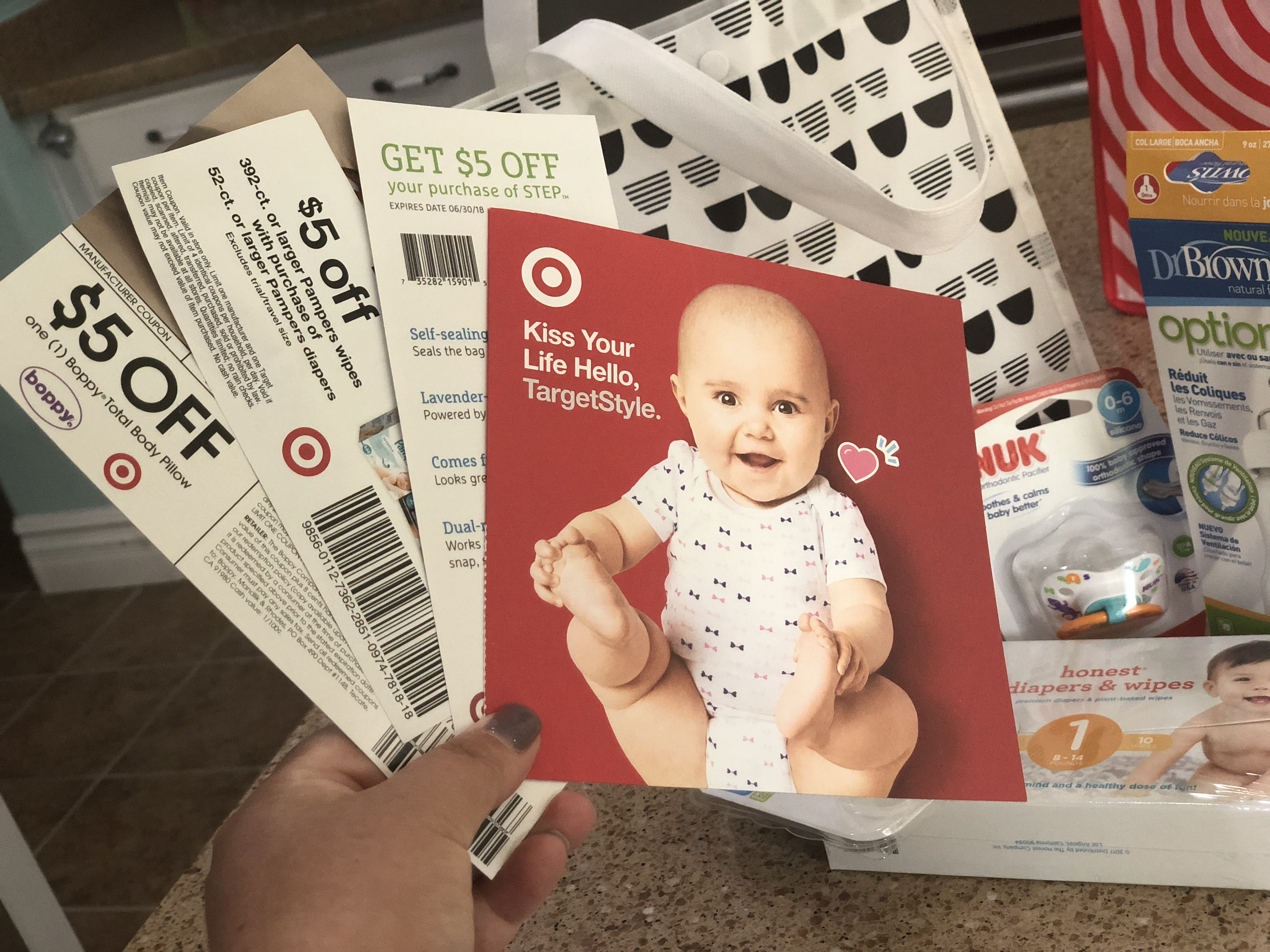 Get a free registry baby gift bag like this one for registering for your baby at Target! High value coupons found inside Target Baby Bag