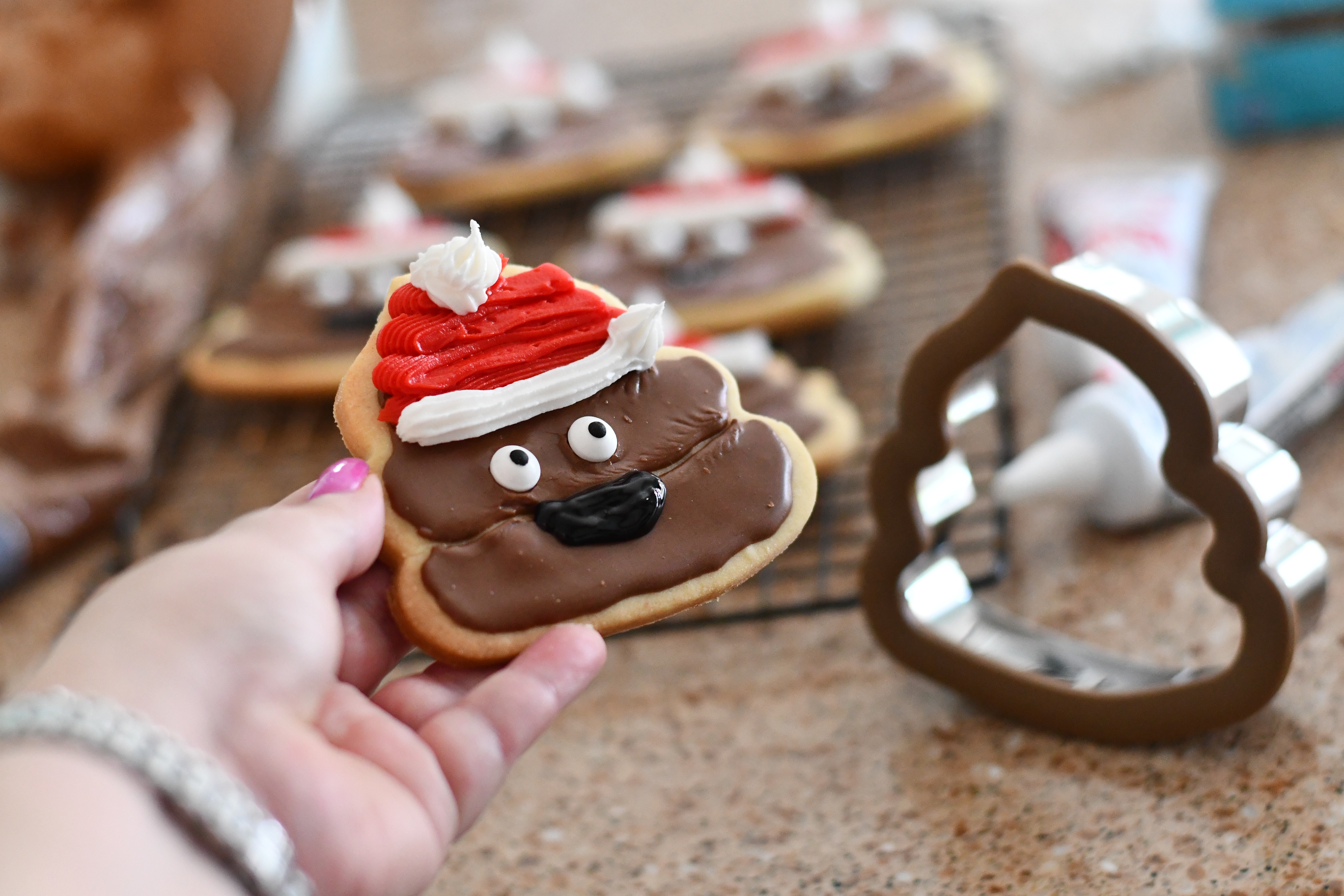 DIY Poop Emoji Santa Christmas Cookies – Completed cookie closeup