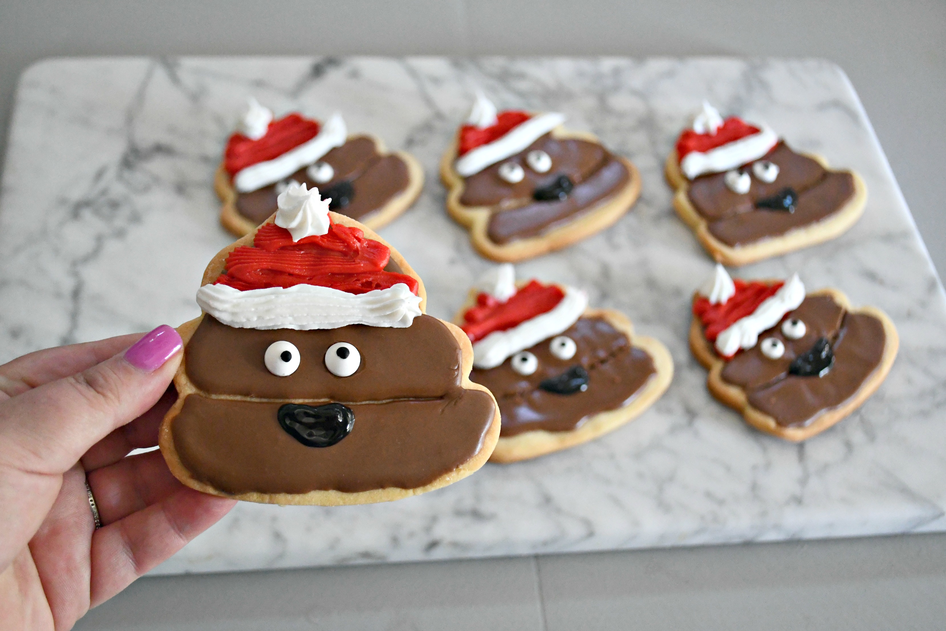 DIY Poop Emoji Santa Christmas Cookies – Closeup of completed cookies