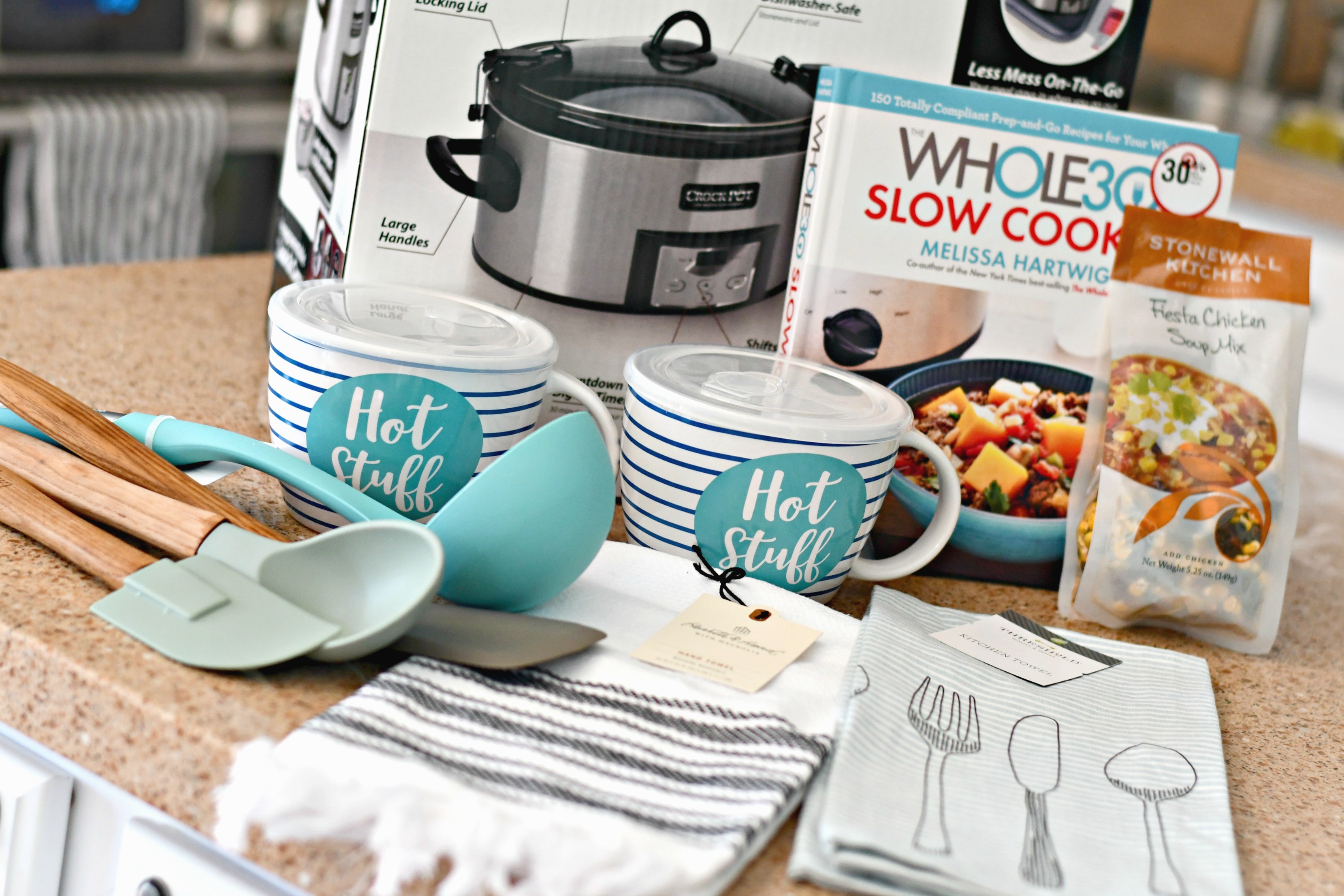diy gift slow cooker gift basket – serving spoons, towels, cookbook, packet, and slow cooker