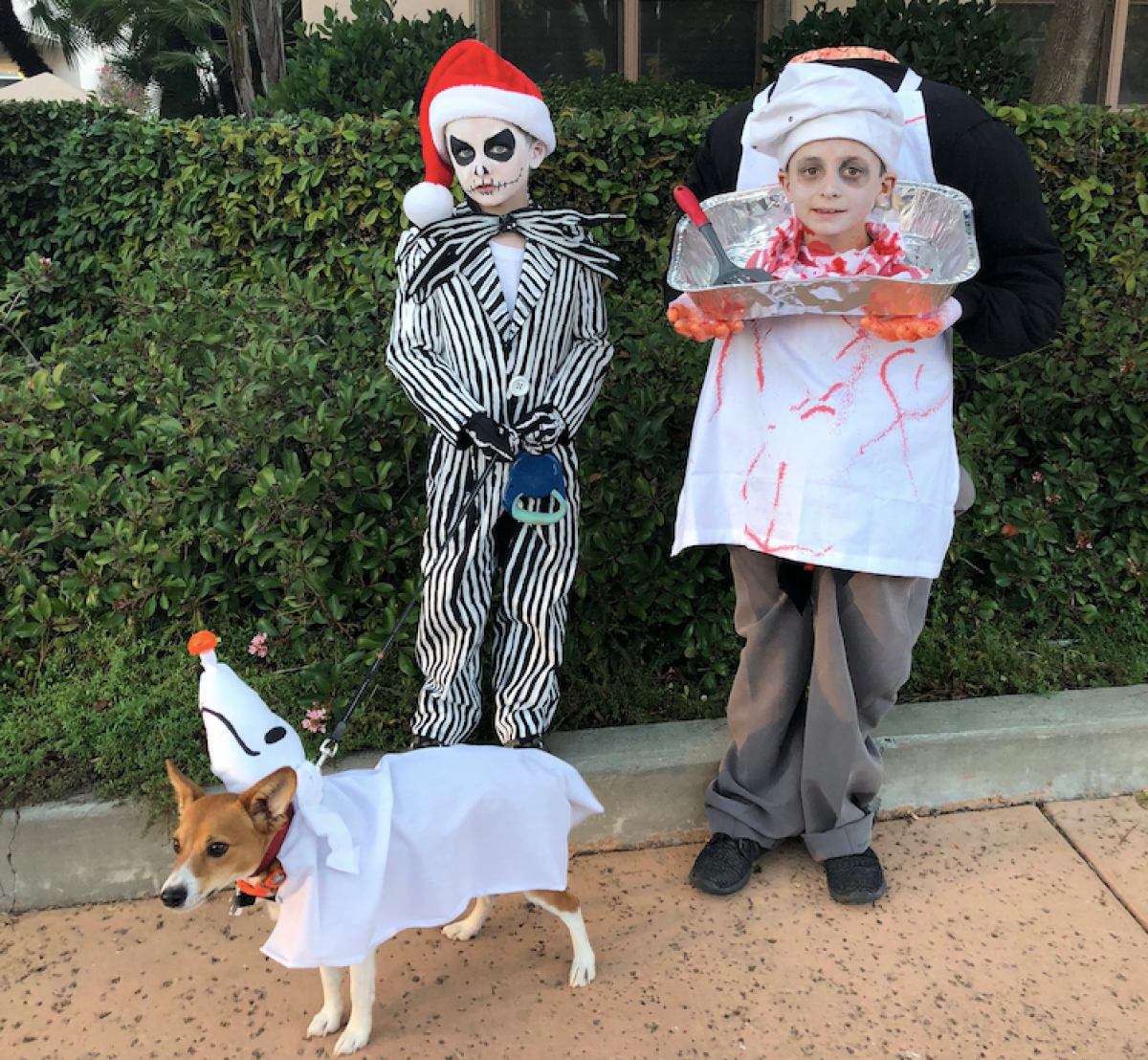 boys dressed as Jack Skellington and a headless chef for Halloween