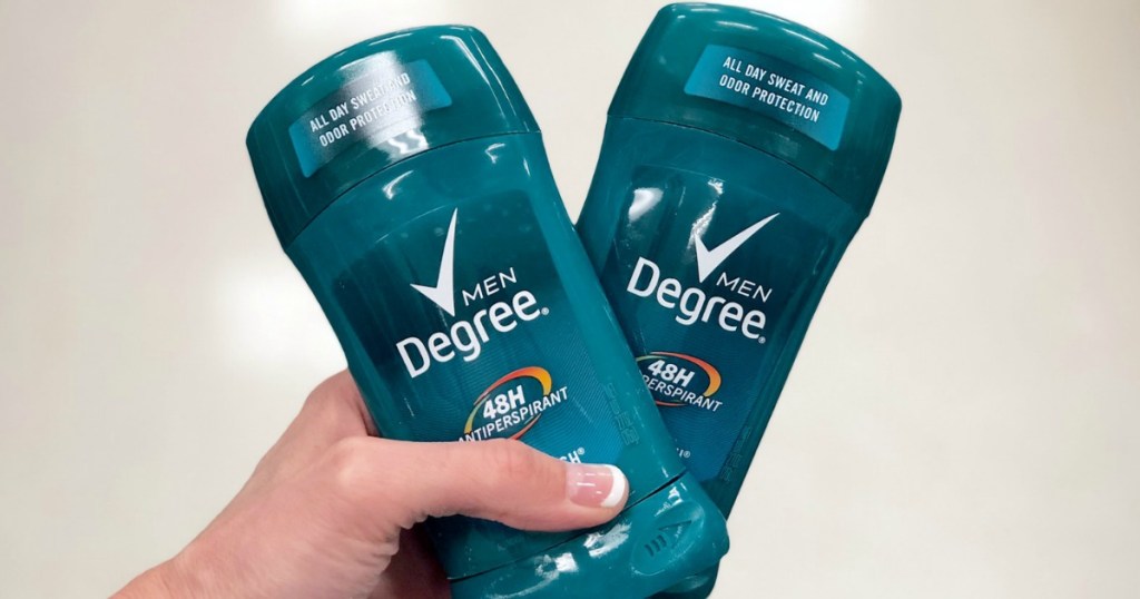 hand holding two degree deodorant sticks