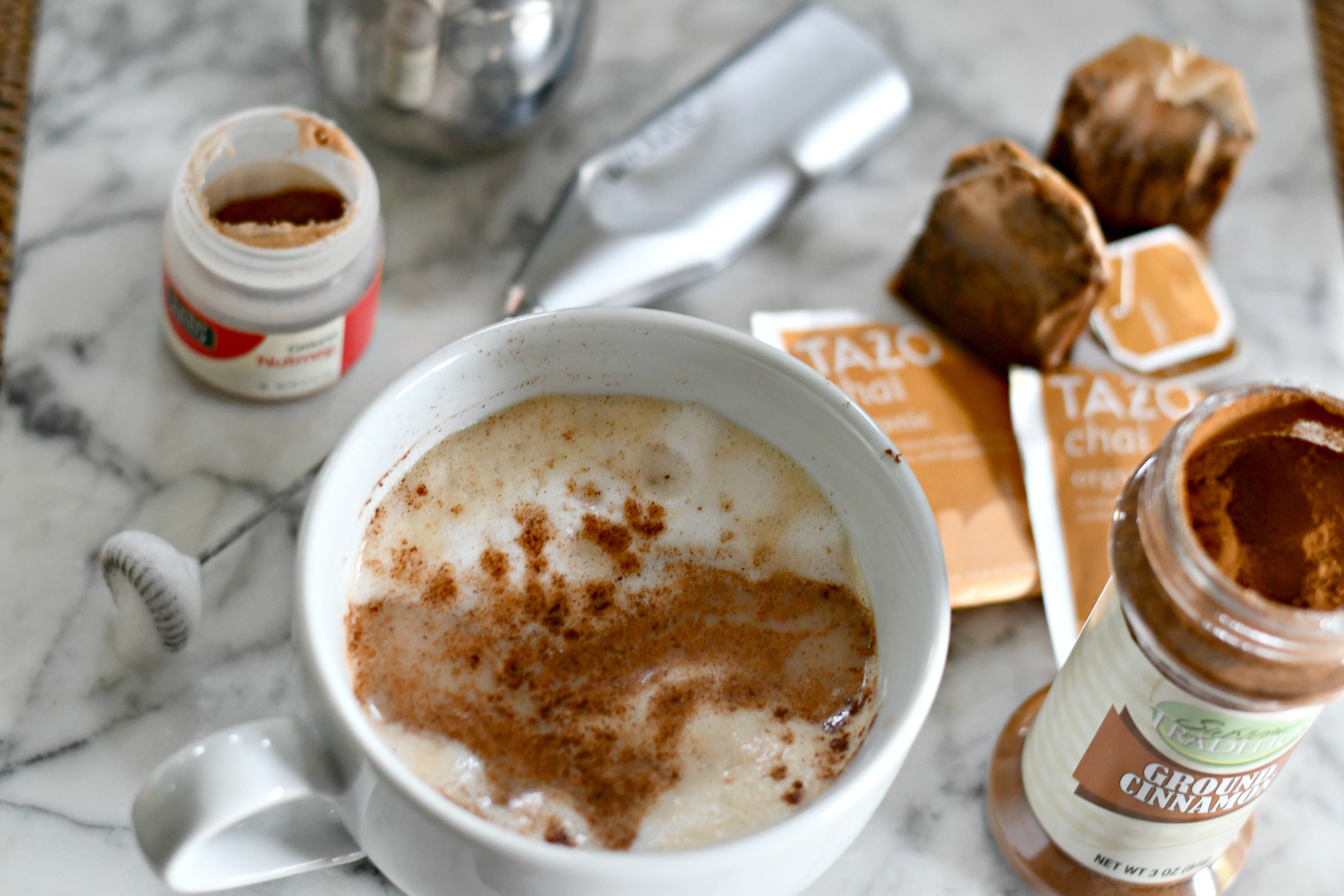 diy starbucks chai latte with cinnamon sprinkled on top