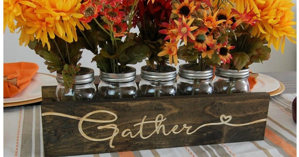 mason jar centerpiece with colorful flowers 
