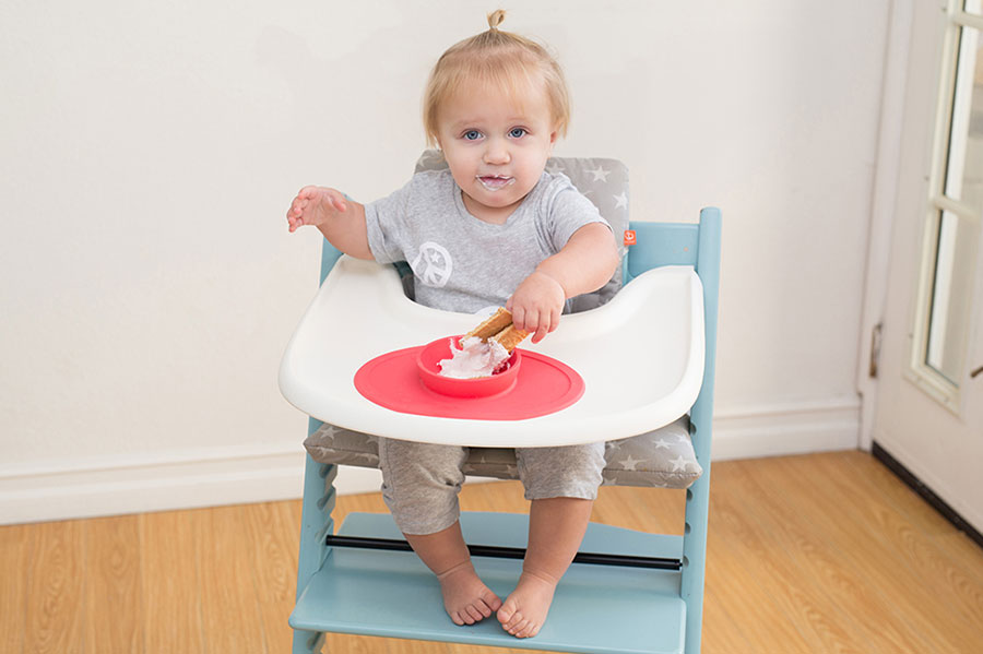baby in high chair with ezpz tiny bowl