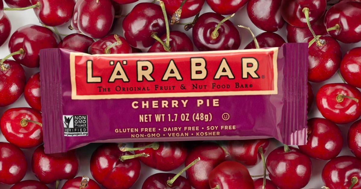 Larabar Cherry Pie bar laying on cherries
