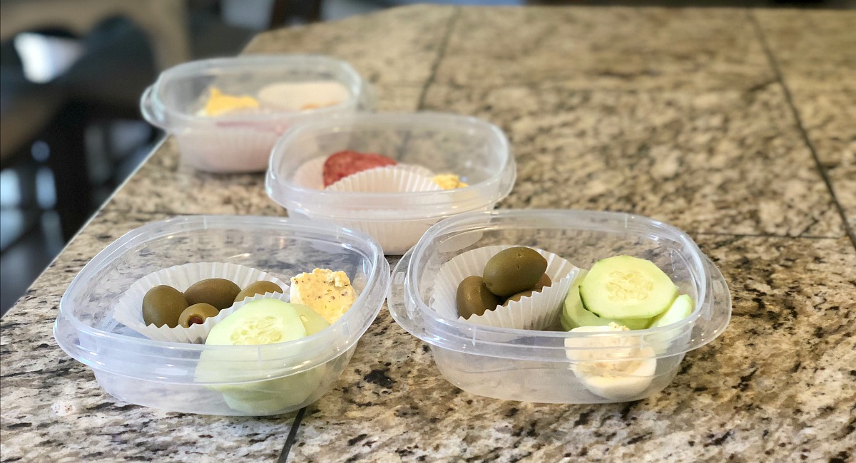vegetarian meal planning tips for a meat-loving family – low carb snacks of olives, hard-boiled eggs, and cucumbers