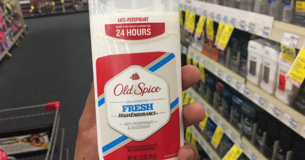 hand holding old spice deodorant 