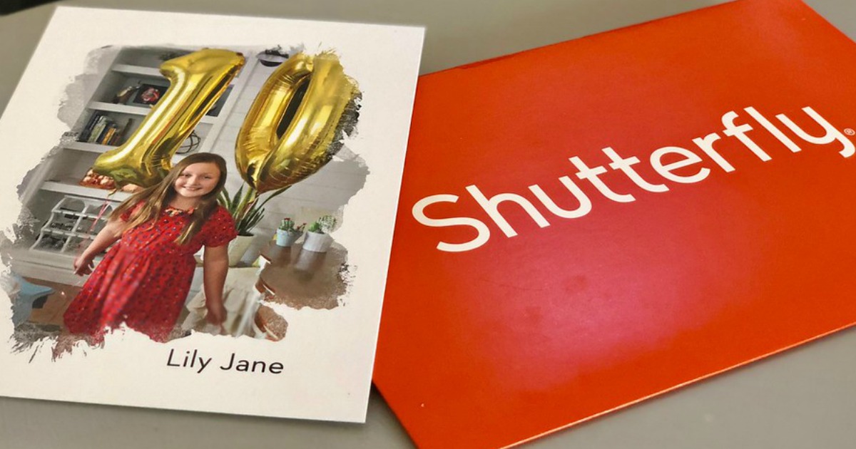 8x10 photo print of girl with baloons next to a Shutterfly box