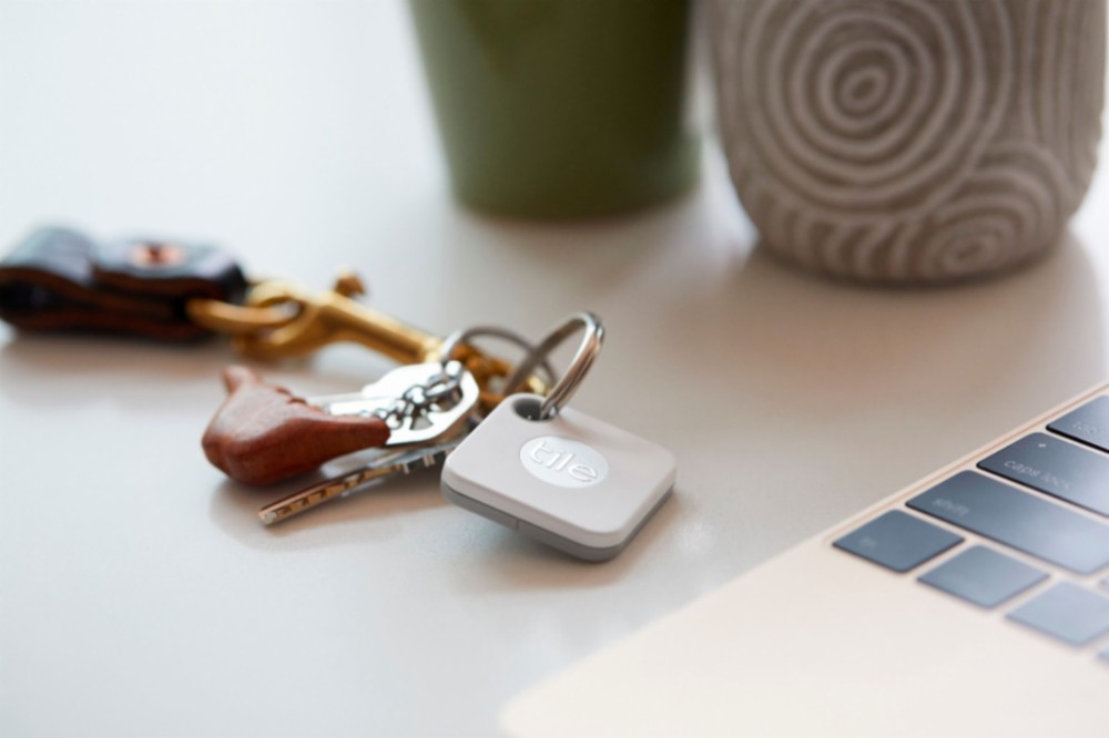 Tile Tracker attached to keychain on counter