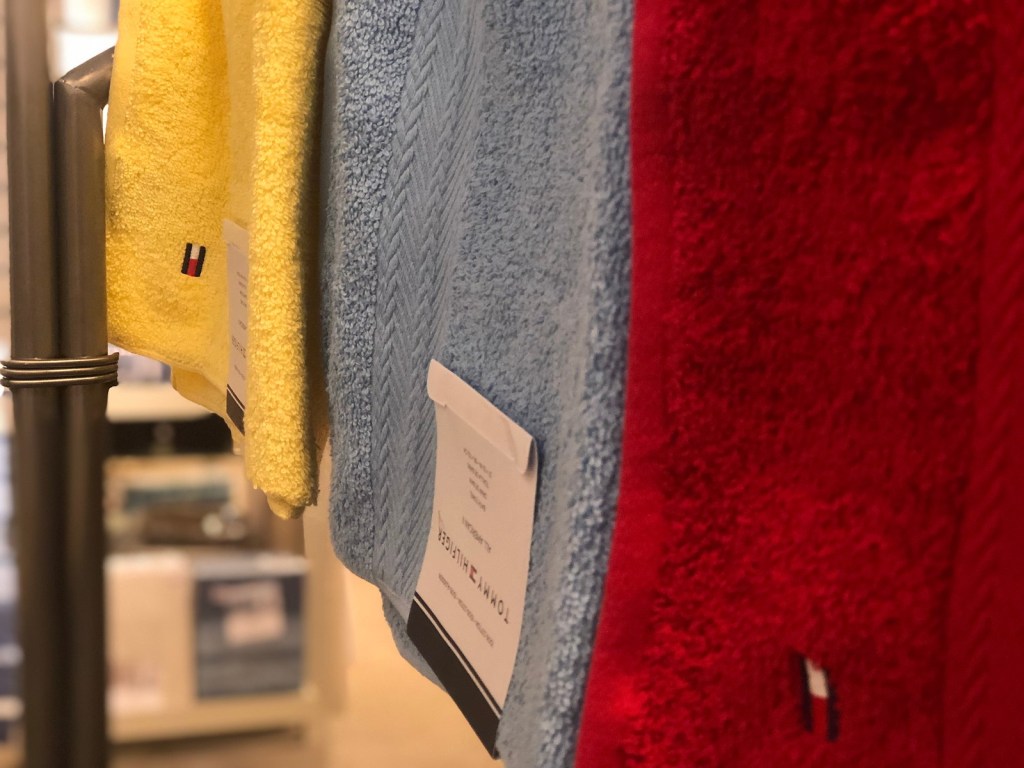 tommy hilfiger towels hanging at store