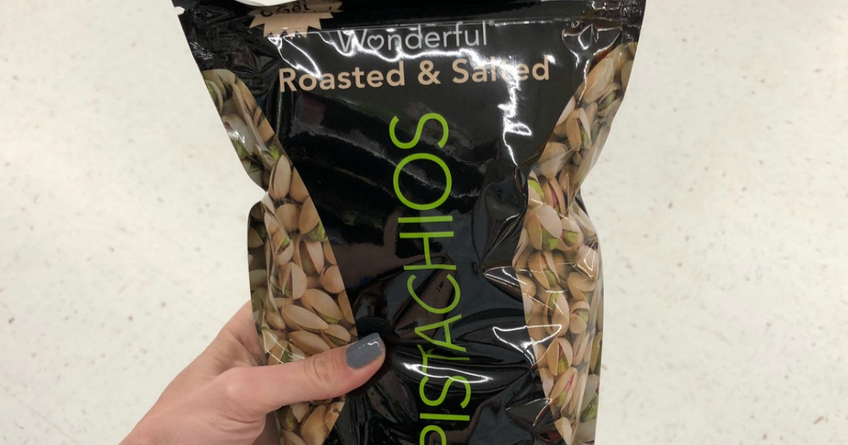 hand holding bag of Wonderful Pistachios