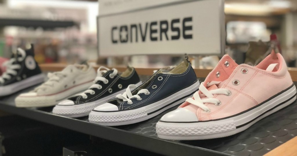 row of different colored converse shoes