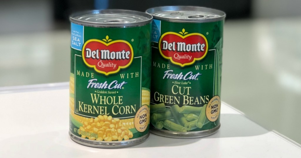 can of corn and green beans on counter 