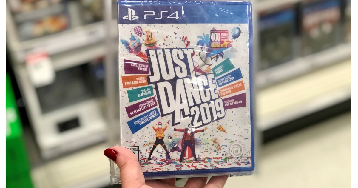 hand holding just dance ps4 in store