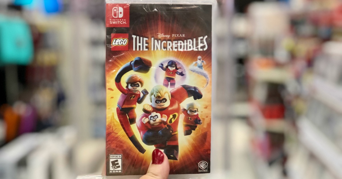 hand holding the incredibles video game nintendo switch in store