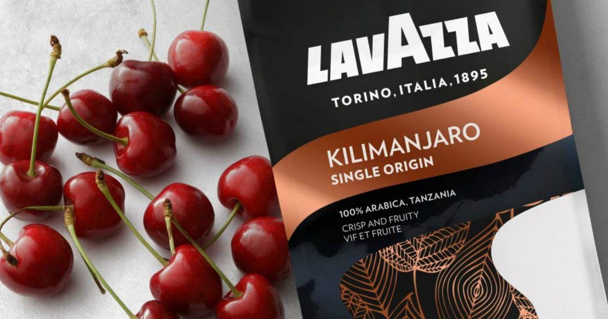 Lavazza coffee surrounded with cherries