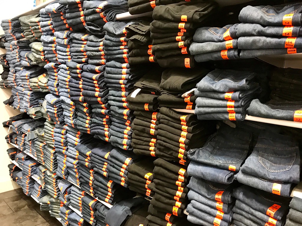 Wall of children's jeans at The Childrens Place