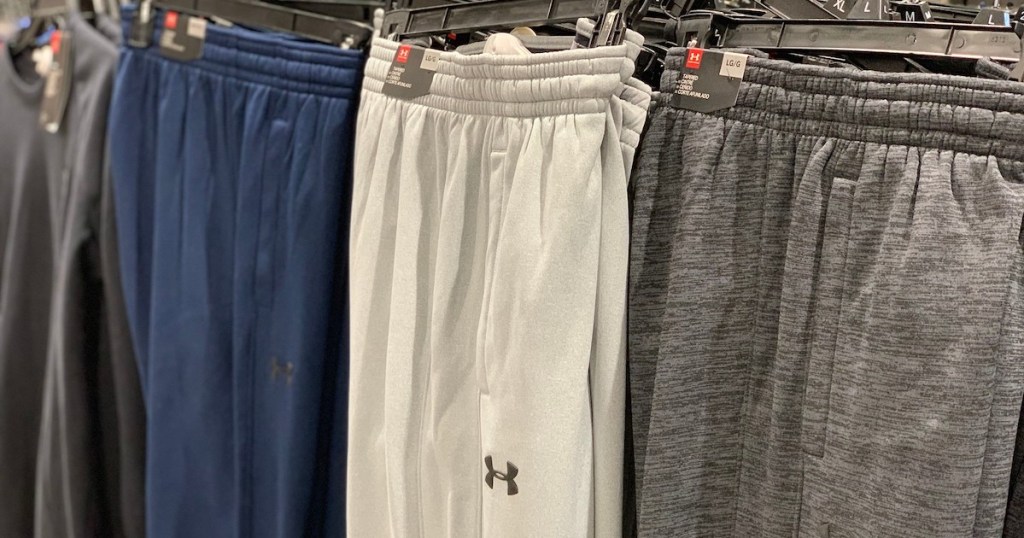 blue, white, and grey men's under armour shorts
