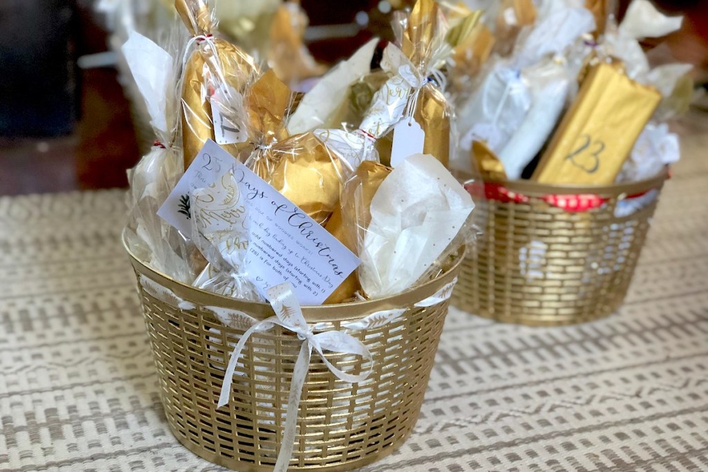 gold baskets with wrapped advent countdown presents inside