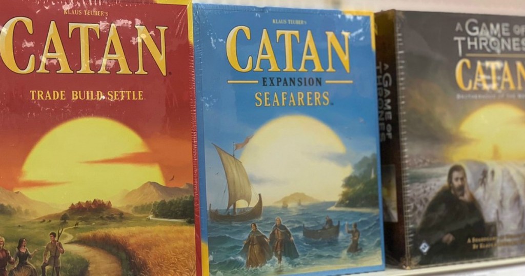 Catan expansion sets boards on store shelf