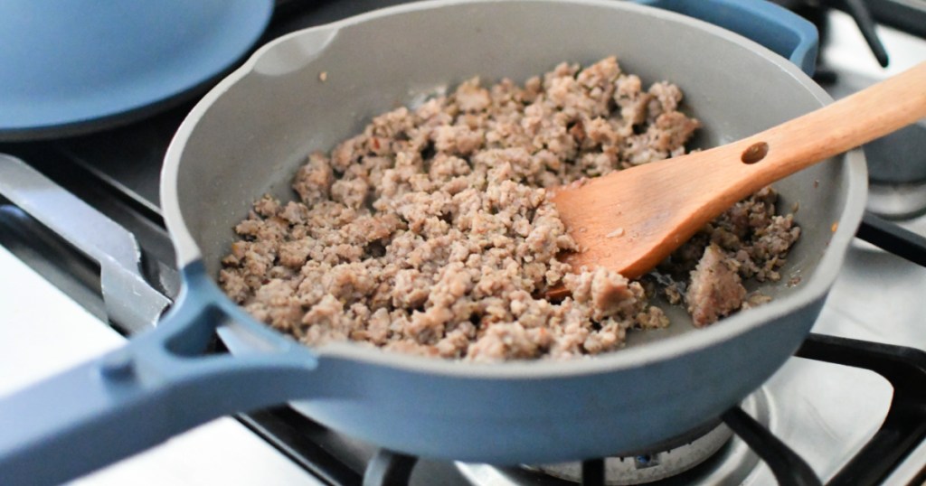 cooking sausage in a skillet 