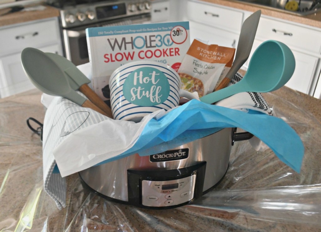 A Crockpot Gift Basket filled with small cooking gifts