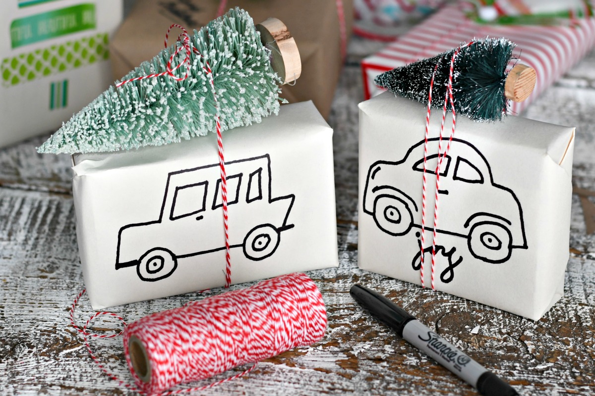 vehicles drawn on gifts tied with twine and topped with brush trees
