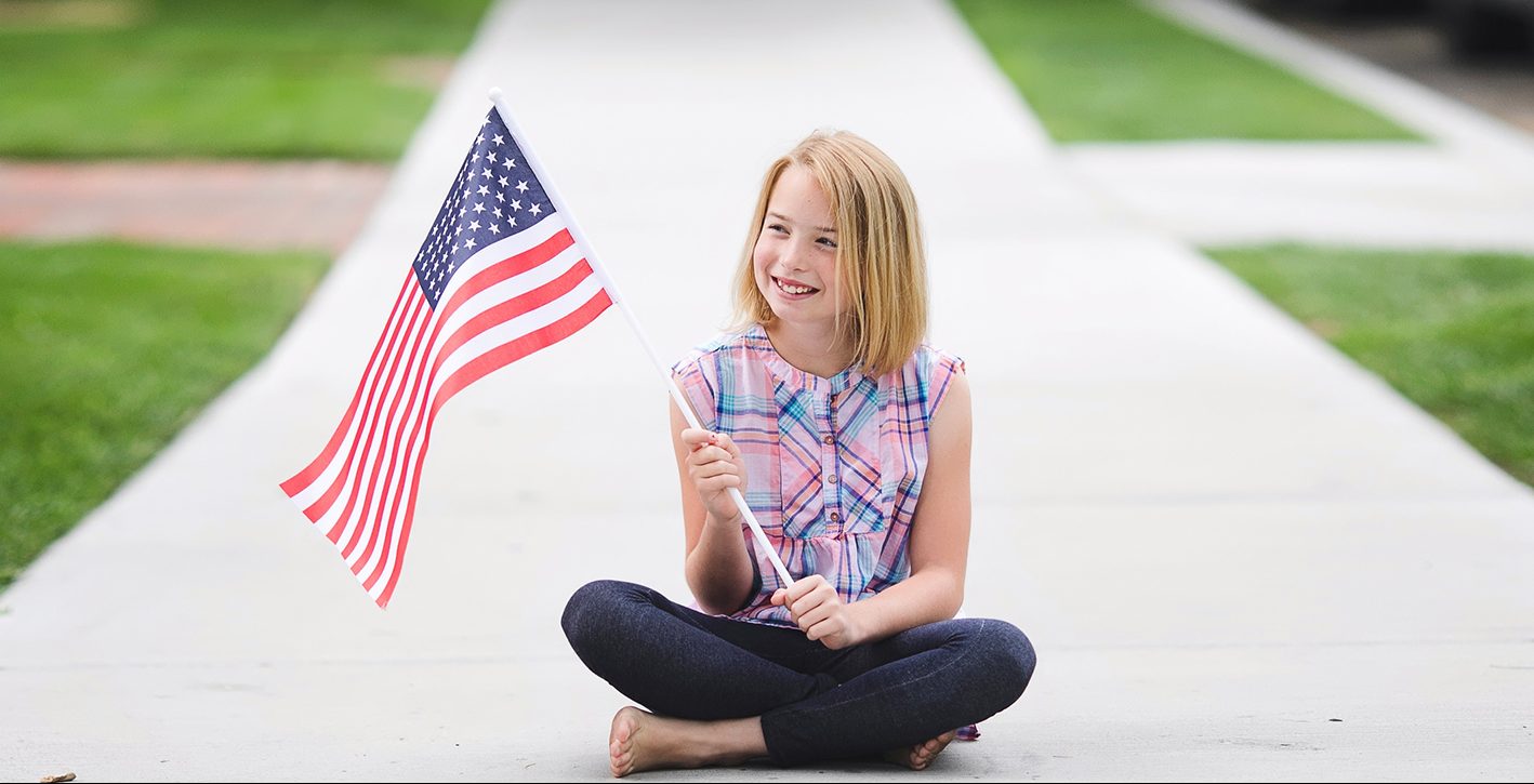 piper holding an American flag