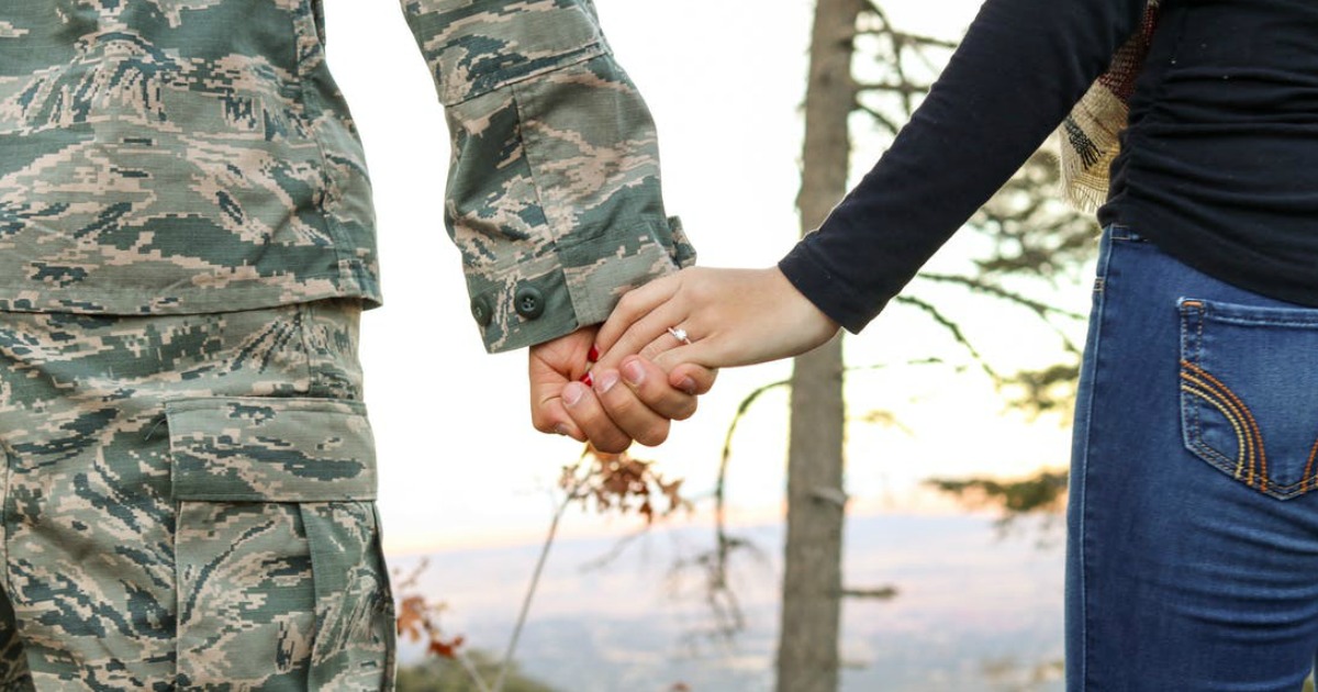 military spouses holding hands