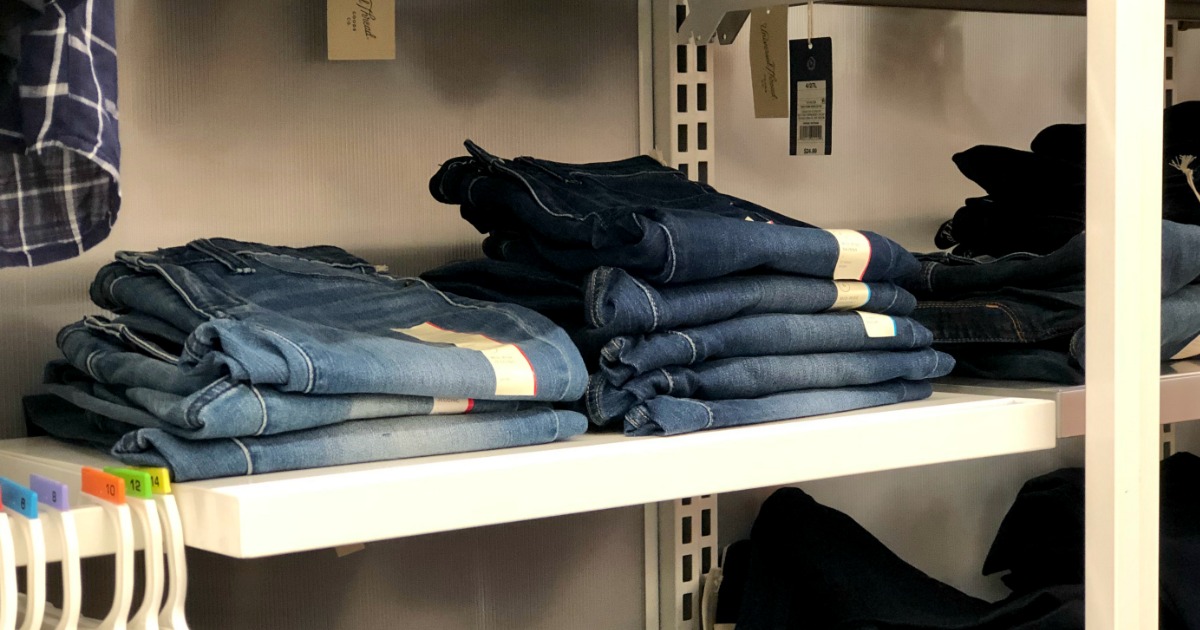stacks of jeans on a Target store shelf