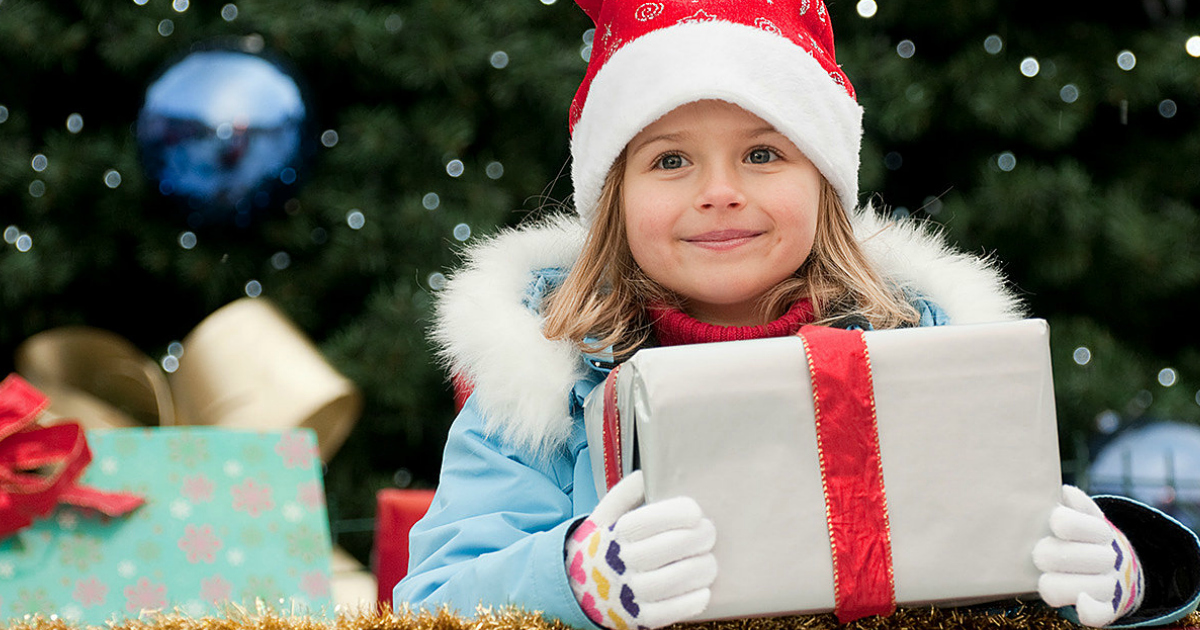 Christmas presents and young girl - free shoprunner membership