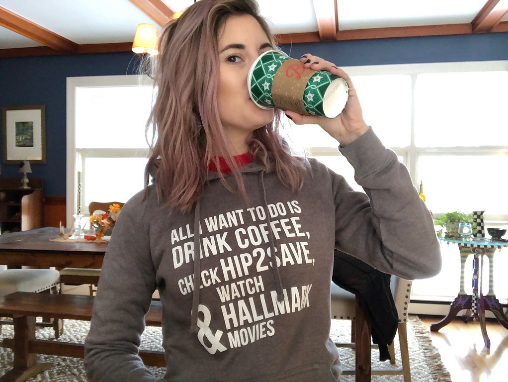 woman drinking Starbucks coffee 