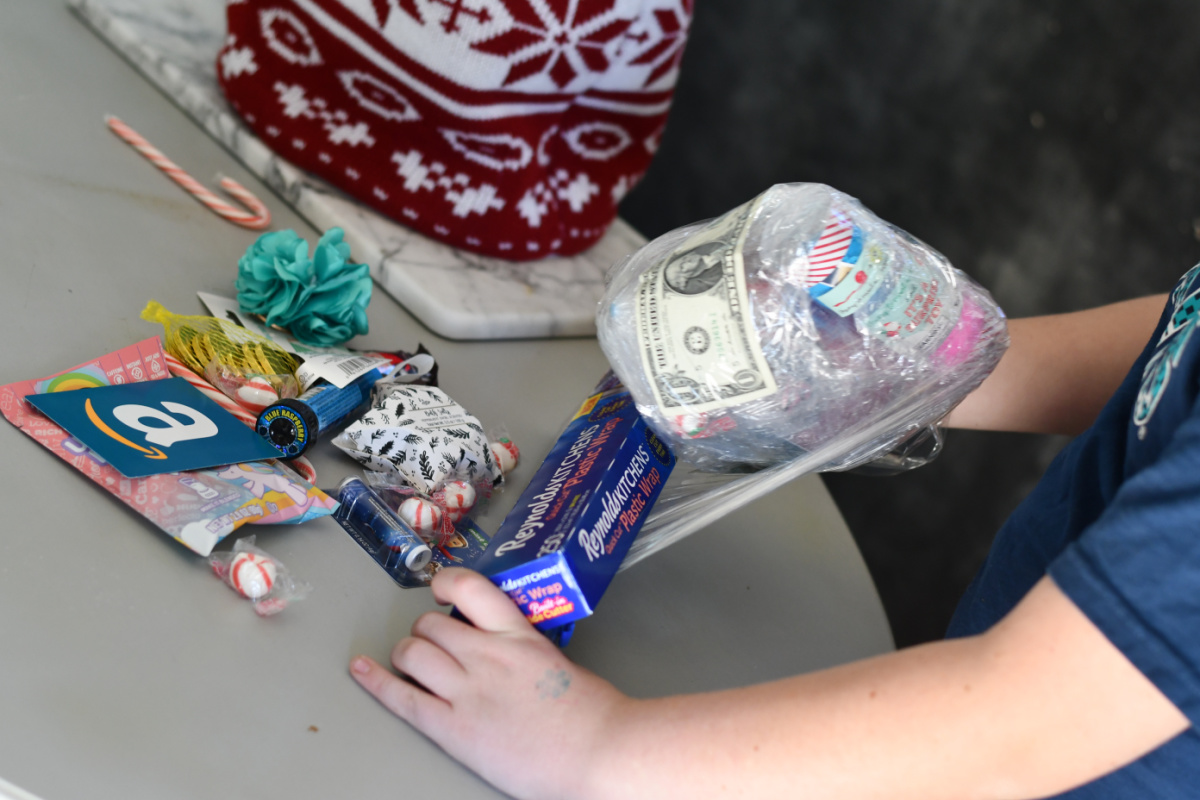How To Play The Hilarious Saran Wrap Game At Your Holiday Party Saran Wrap Ball Game Prep 