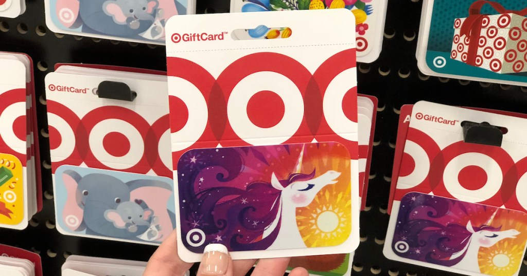 hand holding up unicorn target gift card